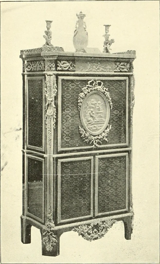 An illustration from An historical guide to French interiors, furniture, decoration, woodwork, & allied arts during the last half of the seventeenth century, the whole of the eighteenth century, and the earlier part of the nineteenth, 1900, leaf 272