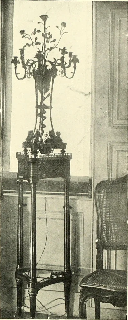 An illustration from An historical guide to French interiors, furniture, decoration, woodwork, & allied arts during the last half of the seventeenth century, the whole of the eighteenth century, and the earlier part of the nineteenth, 1900, leaf 274