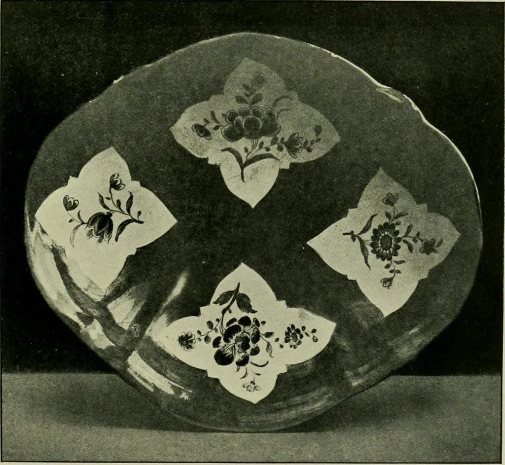 An illustration from A history and description of the old French faïence : with an account of the revival of faïence painting in France, 1903, leaf 350
