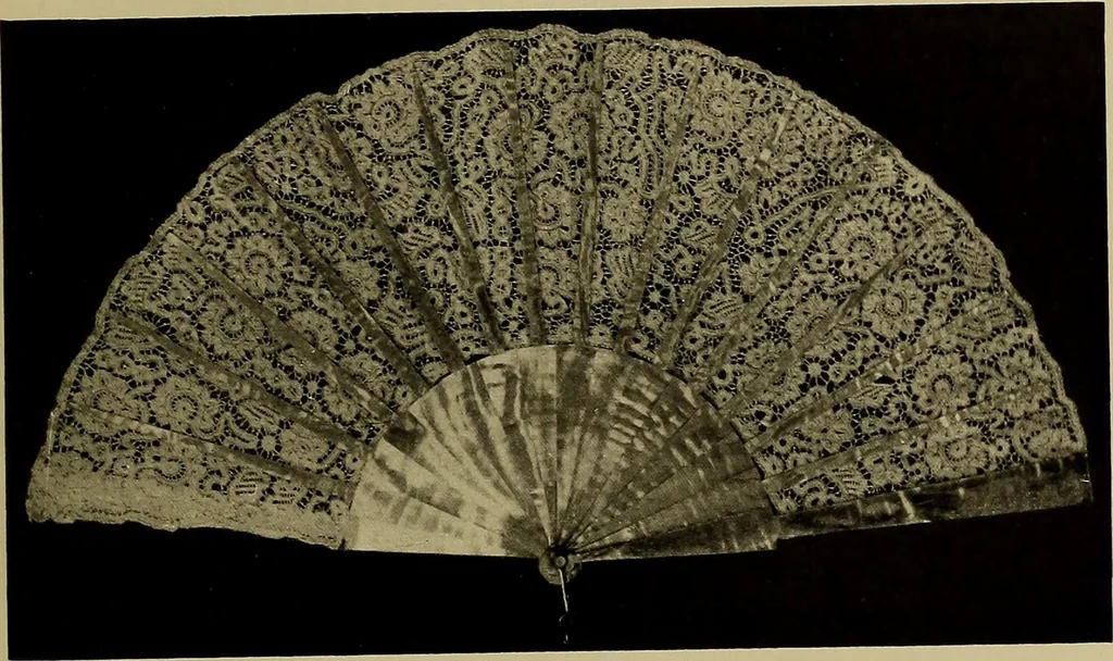 An illustration from A history of hand-made lace : Dealing with the origin of lace, the growth of the great lace centres, the mode of manufacture, the methods of distinguishing and the care of various kinds of lace ..., 1900, leaf 102