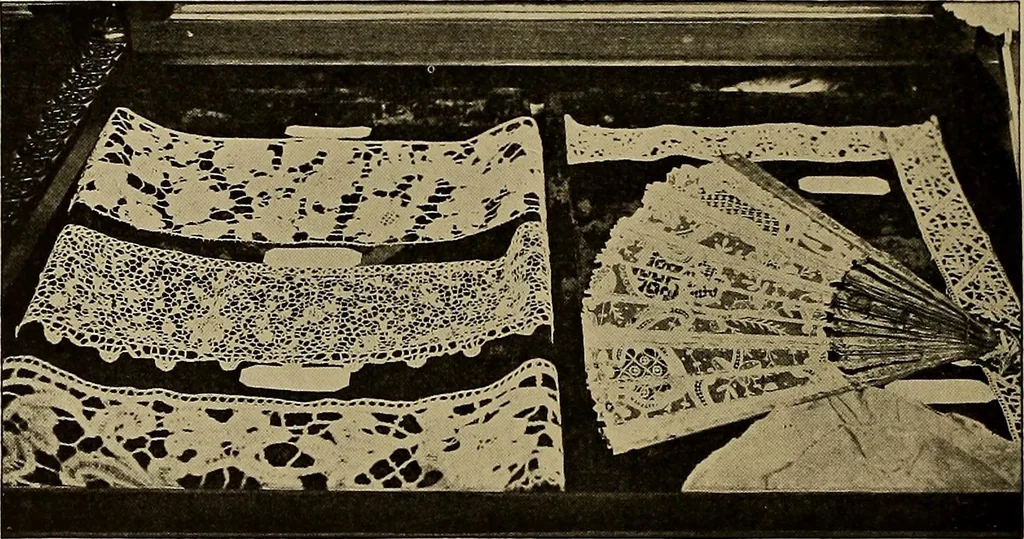 An illustration from A history of hand-made lace : Dealing with the origin of lace, the growth of the great lace centres, the mode of manufacture, the methods of distinguishing and the care of various kinds of lace ..., 1900, leaf 129