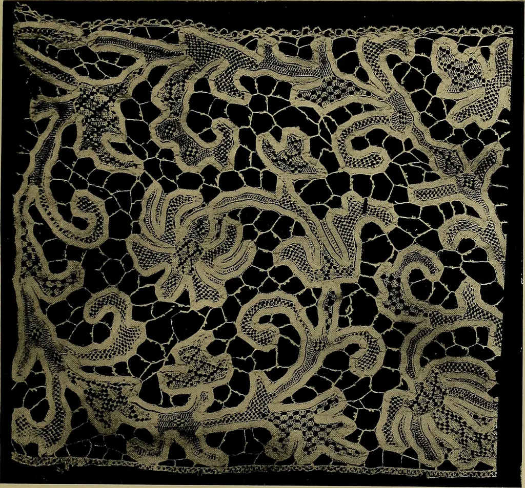 An illustration from A history of hand-made lace : Dealing with the origin of lace, the growth of the great lace centres, the mode of manufacture, the methods of distinguishing and the care of various kinds of lace ..., 1900, leaf 214