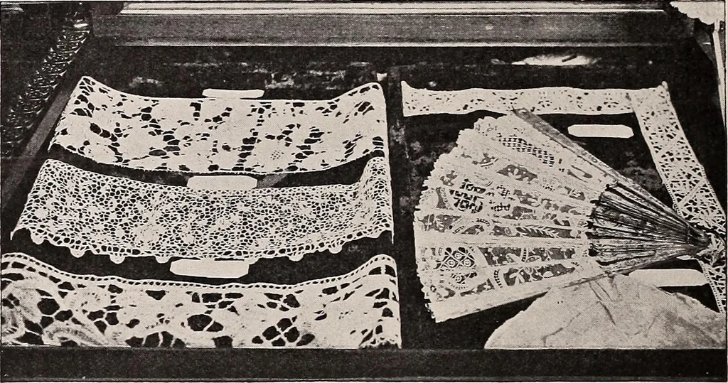 An illustration from A history of hand-made lace : dealing with the origin of lace, the growth of the great lace centres, the mode of manufacture, the methods of distinguishing and the care of various kinds of lace, 1900, leaf 129