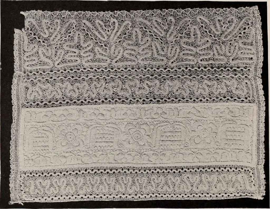 An illustration from A history of hand-made lace : dealing with the origin of lace, the growth of the great lace centres, the mode of manufacture, the methods of distinguishing and the care of various kinds of lace, 1900, leaf 165