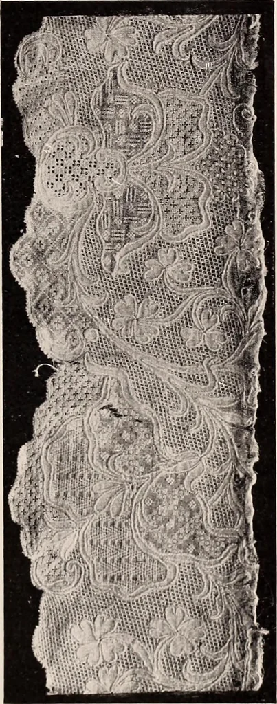 An illustration from A history of hand-made lace : dealing with the origin of lace, the growth of the great lace centres, the mode of manufacture, the methods of distinguishing and the care of various kinds of lace, 1900, leaf 190