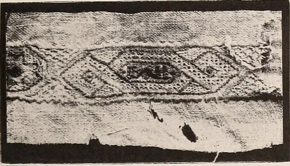 An illustration from A history of hand-made lace : dealing with the origin of lace, the growth of the great lace centres, the mode of manufacture, the methods of distinguishing and the care of various kinds of lace, 1900, leaf 22