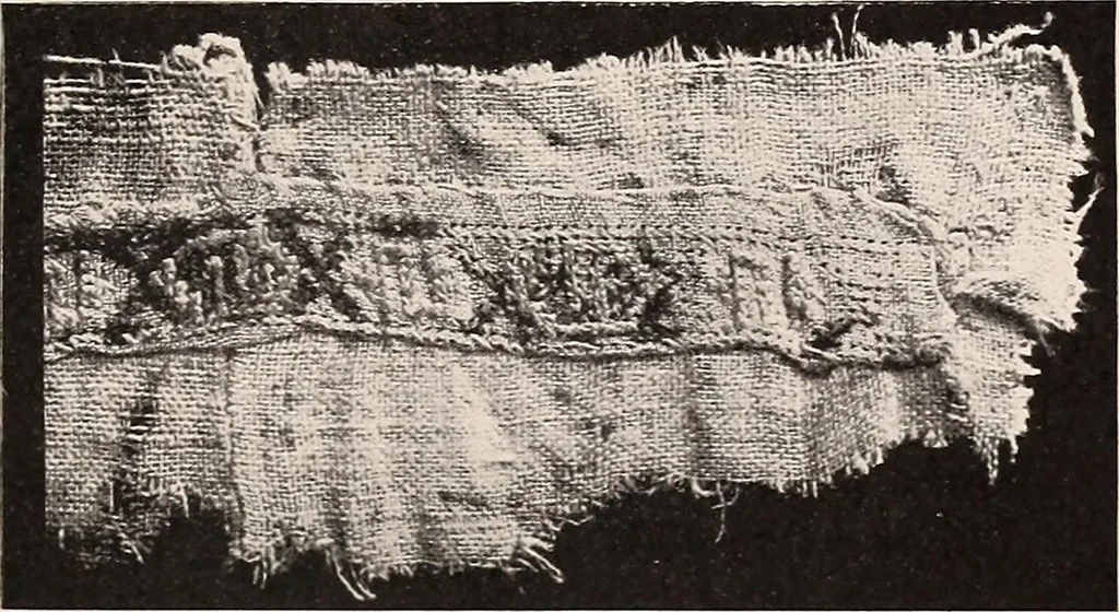 An illustration from A history of hand-made lace : dealing with the origin of lace, the growth of the great lace centres, the mode of manufacture, the methods of distinguishing and the care of various kinds of lace, 1900, leaf 26