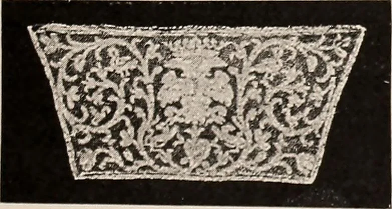 An illustration from A history of hand-made lace : dealing with the origin of lace, the growth of the great lace centres, the mode of manufacture, the methods of distinguishing and the care of various kinds of lace, 1900, leaf 46