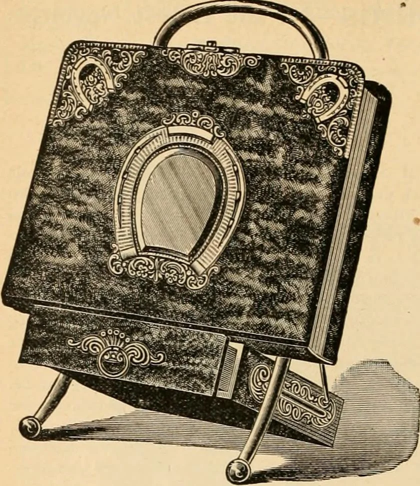 An illustration from Holiday specialties : jewelry, watches, silverware, musical goods, leather goods, sporting goods, etc., 1900, leaf 63