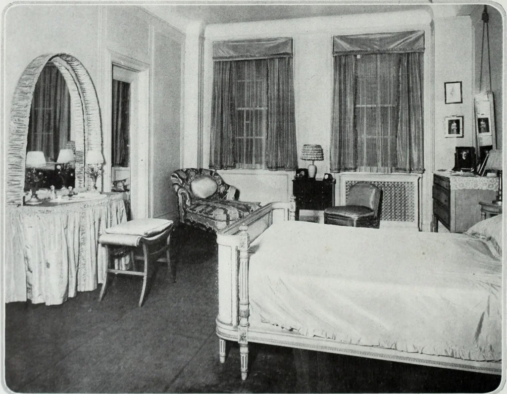 An illustration from House & garden's book of interiors, containing over three hundred illustrations of living rooms, dining rooms, libraries, halls, bedrooms, porches, breakfast rooms, nurseries, kitchens, bathrooms and the use of decorative accessories and curtains, together with practical suggestions for the furnishing and decorating of each type of room in the house, 1920, leaf 101