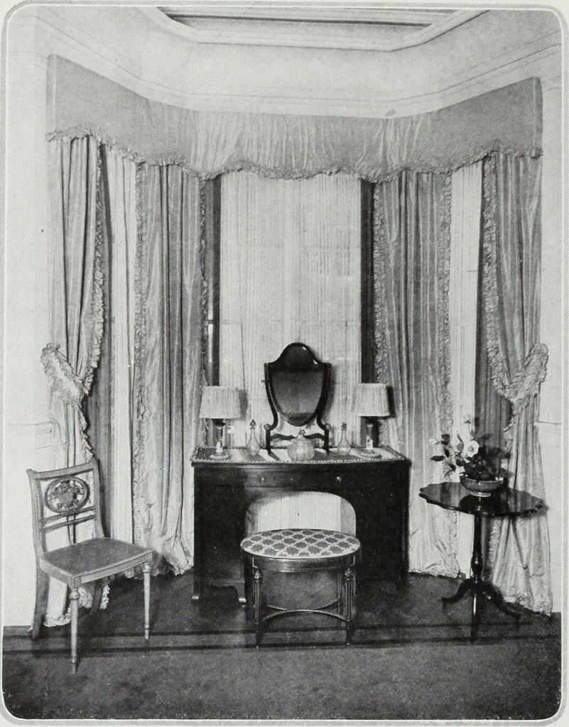 An illustration from House & garden's book of interiors, containing over three hundred illustrations of living rooms, dining rooms, libraries, halls, bedrooms, porches, breakfast rooms, nurseries, kitchens, bathrooms and the use of decorative accessories and curtains, together with practical suggestions for the furnishing and decorating of each type of room in the house, 1920, leaf 63