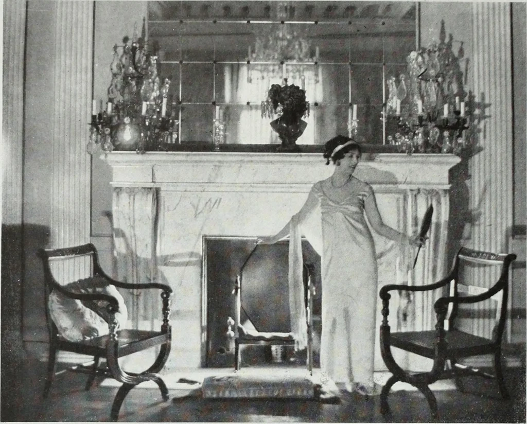 An illustration from House & garden's book of interiors, containing over three hundred illustrations of living rooms, dining rooms, libraries, halls, bedrooms, porches, breakfast rooms, nurseries, kitchens, bathrooms and the use of decorative accessories and curtains, together with practical suggestions for the furnishing and decorating of each type of room in the house, 1920, leaf 85