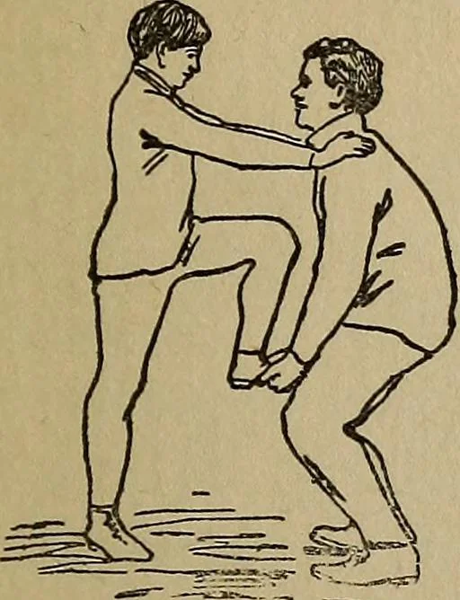 An illustration from How to, a book of tumbling, tricks, pyramids and games;, 1899, leaf 106