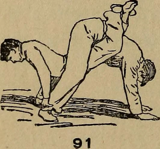 An illustration from How to, a book of tumbling, tricks, pyramids and games;, 1899, leaf 61