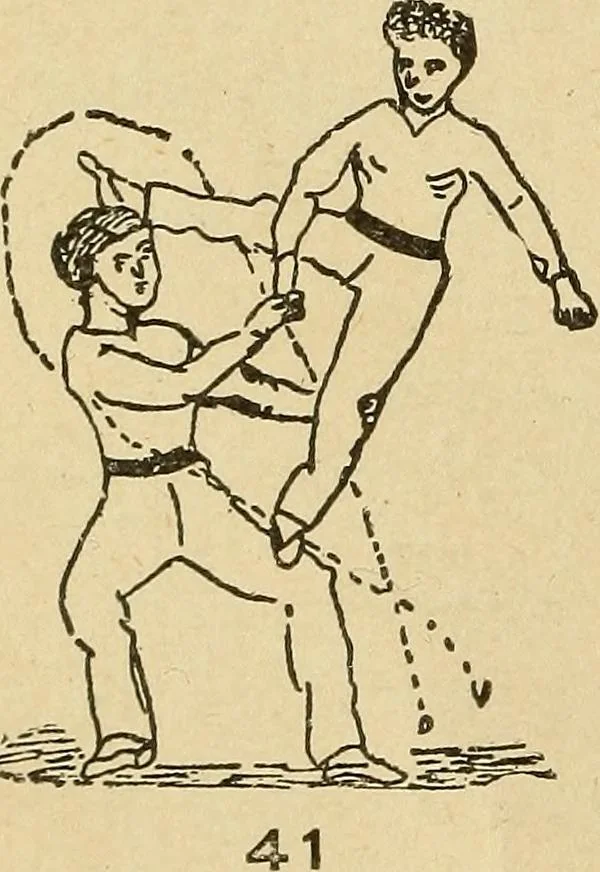 An illustration from How to, a book of tumbling, tricks, pyramids and games;, 1899, leaf 31