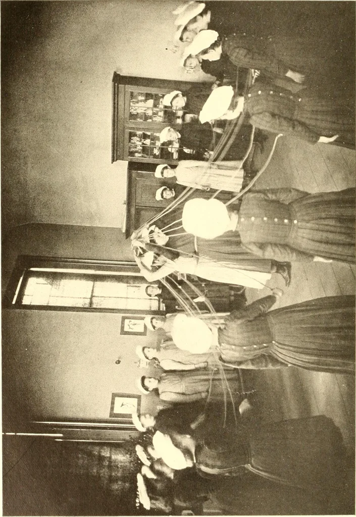 An illustration from How to teach kitchen garden; or, Object lessons in household work, including songs, plays, exercises, and games illustrating household occupations, 1901, leaf 125
