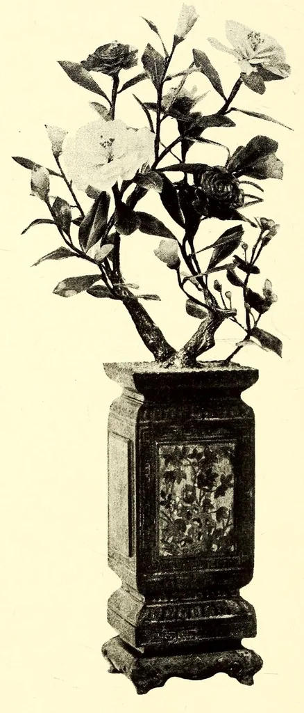 An illustration from Illustrated catalogue of the furniture and embellishments from the Imperial palace, Pekin. Exquisitely wrought gold ornaments from the ceremonial crowns of the former Emperor and Empress of China and numerous other objects of antiquity and distinctive artistic excellence recently : Acquired by the firm of Messrs. Yamanaka & Company, 1917, leaf 54