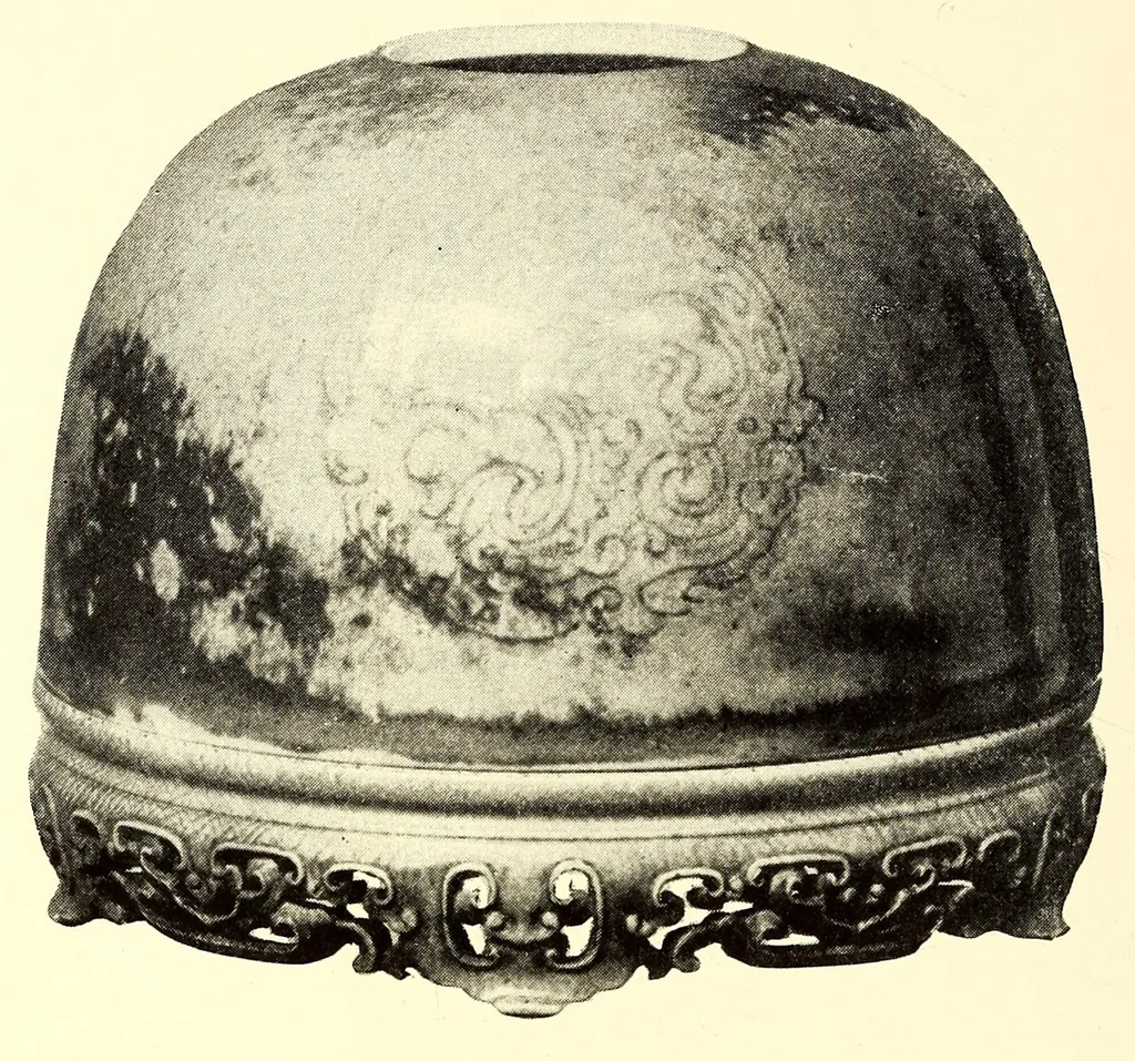 An illustration from Illustrated catalogue of the furniture and embellishments from the Imperial palace, Pekin. Exquisitely wrought gold ornaments from the ceremonial crowns of the former Emperor and Empress of China and numerous other objects of antiquity and distinctive artistic excellence recently : Acquired by the firm of Messrs. Yamanaka & Company, 1917, leaf 72