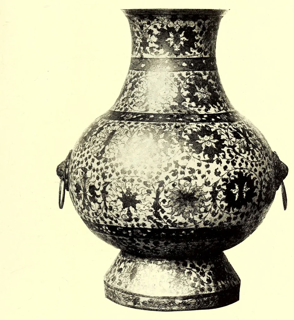 An illustration from Illustrated Catalogue of the Noteworthy Collection of Cloisonne and Other Enamels, Old Japanese Bronzes, Sword Guards, Knife Handles, Swords, Lacquers and Fine Old Brocades : belonging to Dr. Alfred Owre of Minneapolis, 1917, leaf 159