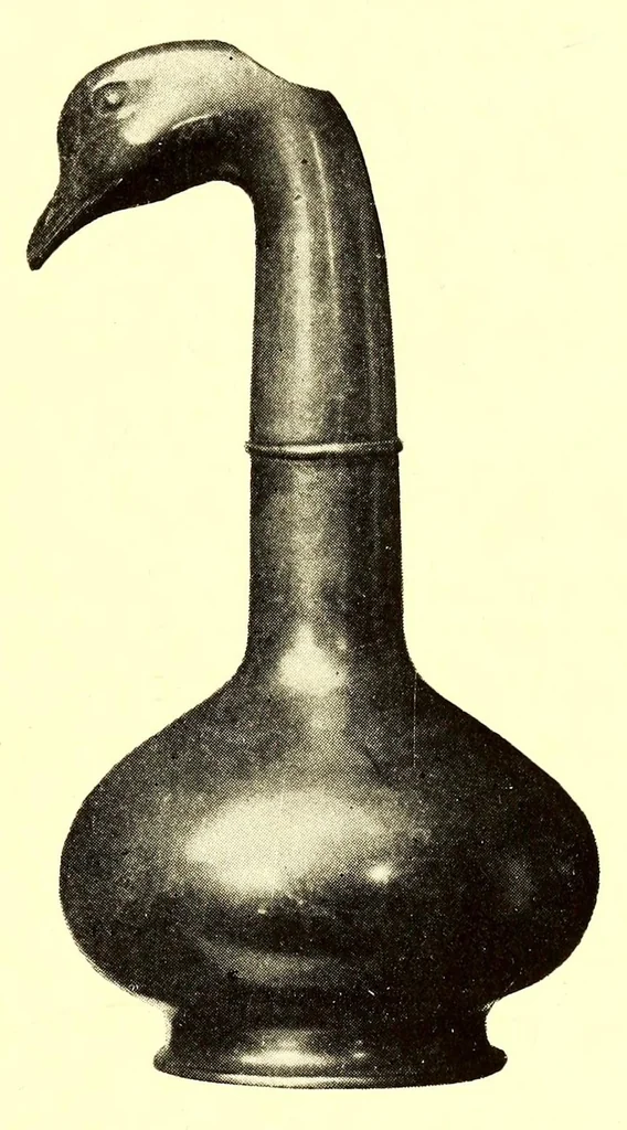 An illustration from Illustrated Catalogue of the Noteworthy Collection of Cloisonne and Other Enamels, Old Japanese Bronzes, Sword Guards, Knife Handles, Swords, Lacquers and Fine Old Brocades : belonging to Dr. Alfred Owre of Minneapolis, 1917, leaf 169