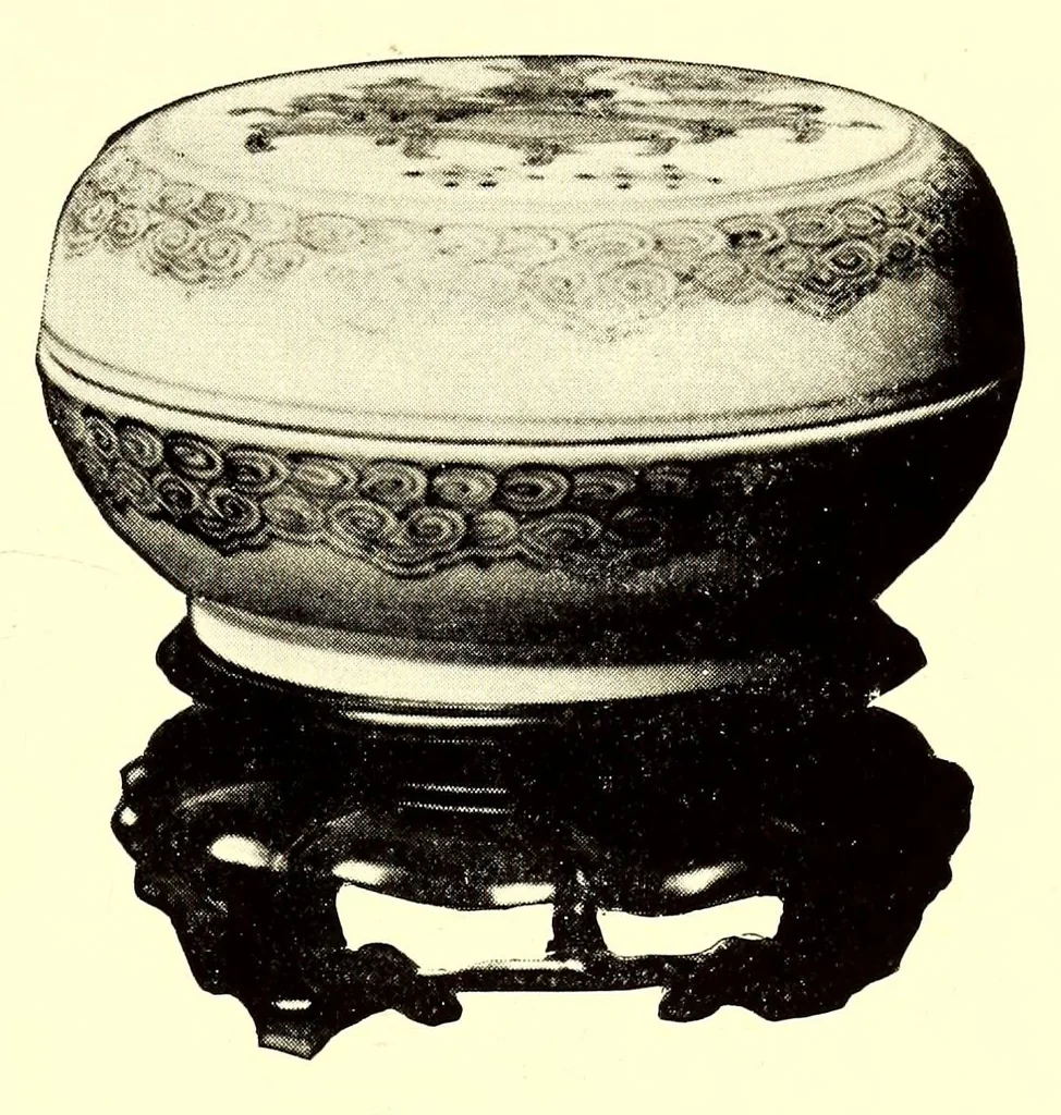 An illustration from Illustrated catalogue of the important collection of antique Chinese porcelains, Sung and Ming potteries, ancient stone sculptures carved jades and other hard stones snuf bottles, Mandarin necklaces, bronzes, enamels, palace furniture and wall panels and a number of rare and fine ancient Chinese paintings of the Sung and Ming periods, 1917, leaf 135