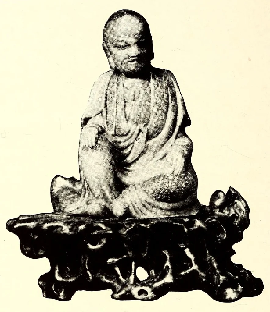 An illustration from Illustrated catalogue of an important collection of antique Chinese porcelains, ancient pottery, fine jades and agates, cloisonne enamels, beautiful snuff bottles, carved rhinoceros horn, bronzes and other objects : formed by Ernest Marsh, J.P. of Haselmore, Surrey, England .., 1916, leaf 42