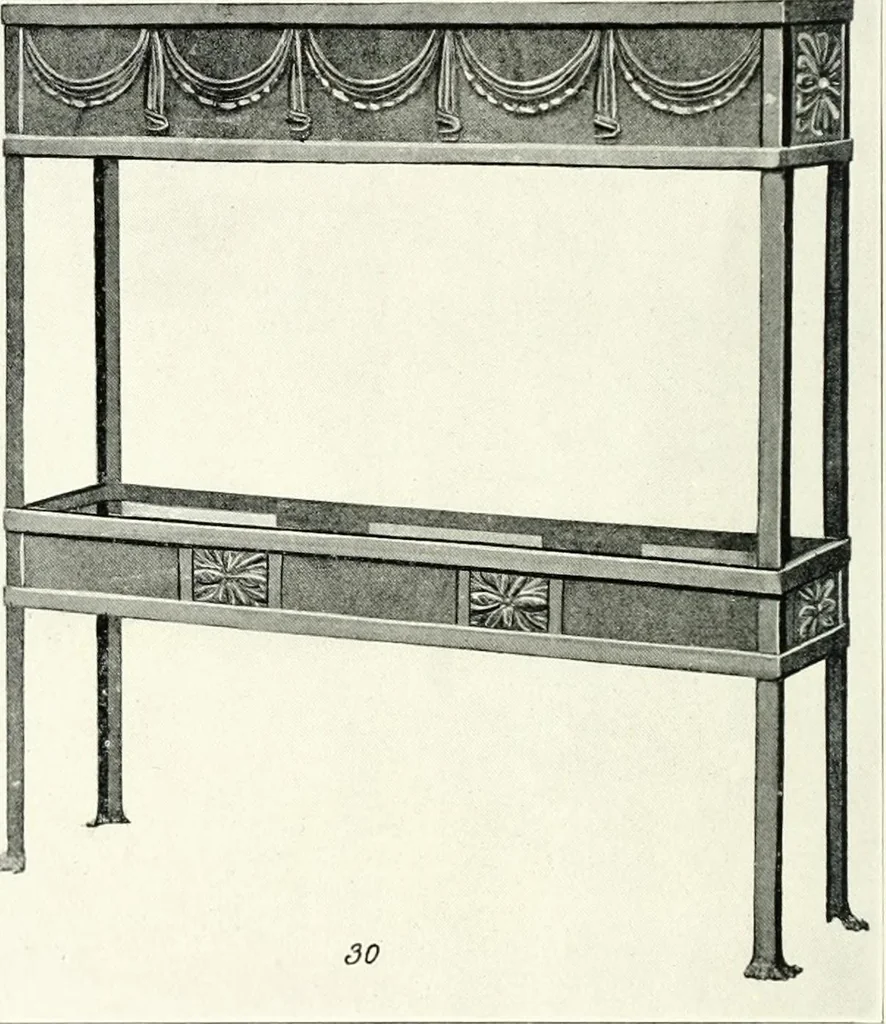 An illustration from Illustrating light iron pressed rosettes, cups, husks, leaves, roses and various ornaments used on lamps and lighting fixtures ..., 1922, leaf 9