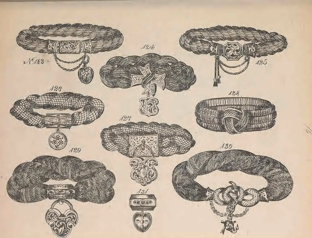 An illustration from The jewellers' book of patterns in hair work : containing a great variety of copper-plate engravings of devices and patterns in hair; suitable for mourning jewellery, brooches, rings, guards, alberts, necklets, lockets, bracelets, miniatures, studs, links, earrings, &c. &c. &c, 1864, leaf 36