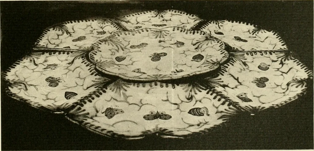 An illustration from Les anciennes faiences de Bruxelles : histoire, fabrication, produits, 1922, leaf 100