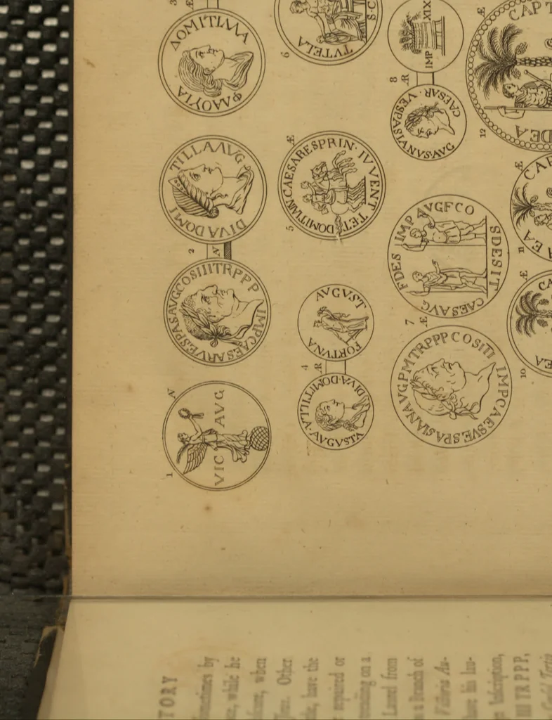 An illustration from The medallic history of imperial Rome : from the first triumvirate, under Pompey, Crassus, and Cæsar, to the removal of the imperial seat, by Constantine the Great ; with the several medals and coins, accurately copied and curiously engraven ; to which is prefixed, an introduction containing a general history of Roman medals ; in two volumes, 1781, leaf 58