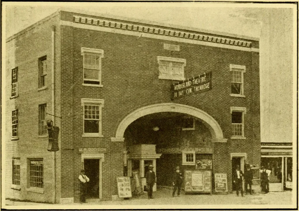 An illustration from Milestones along the color line : a souvenir of Durham, N.C., showing the progress of a race, 1922, leaf 12