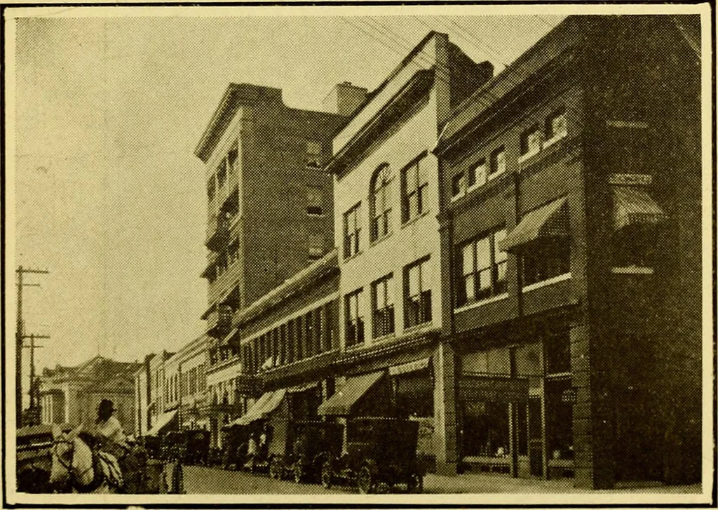 An illustration from Milestones along the color line : a souvenir of Durham, N.C., showing the progress of a race, 1922, leaf 36