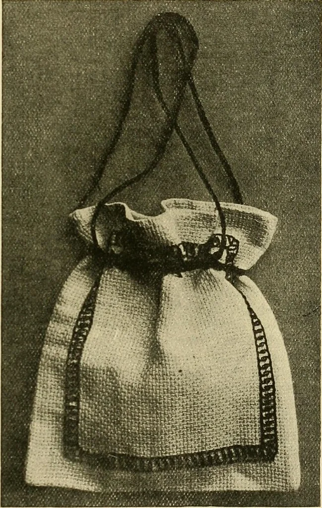 An illustration from Needlework without "specimens": the modern book of school needlework, 1900, leaf 228