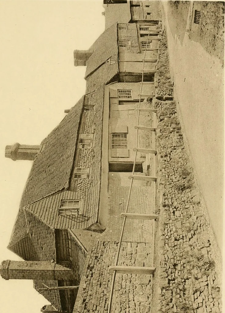 An illustration from Old cottages & farm-houses in Surrey / illustrated on one hundred collotype plates from photographs specially taken by W. Galsworthy Davie, with an introduction and numerous sketches by W. Curtis Green, 1908, leaf 182
