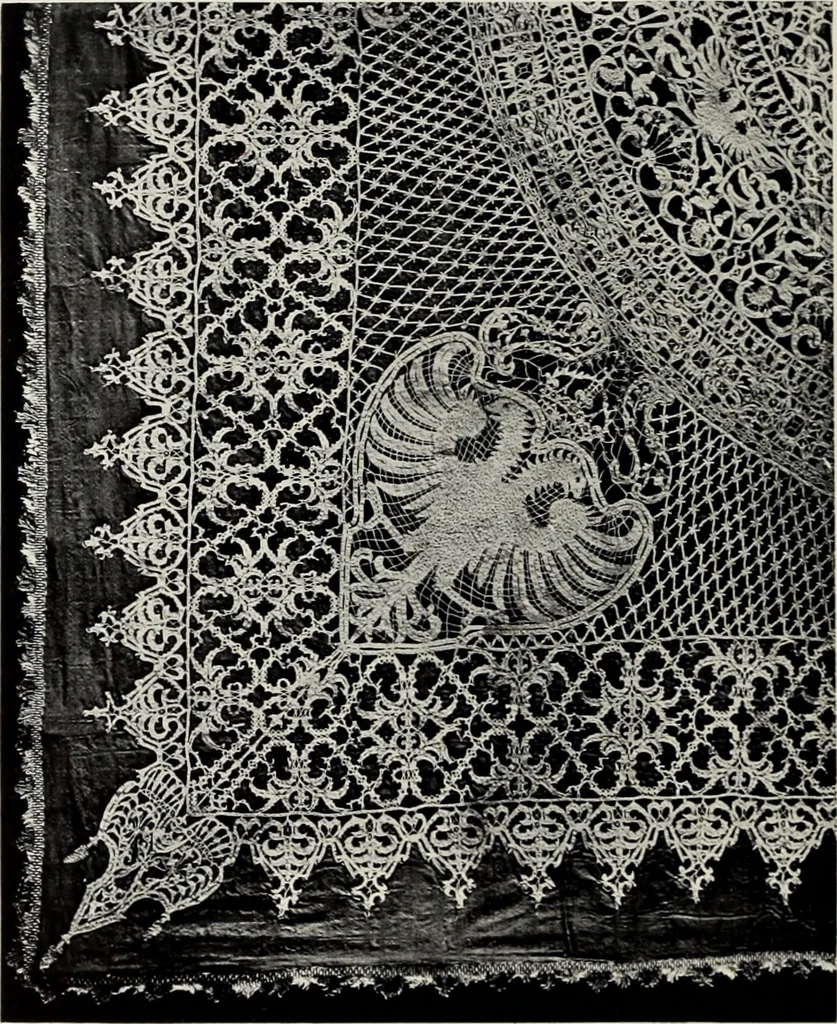 An illustration from Old lace : a handbook for collectors; an account of the different styles of lace, their history, characteristics & manufacture, 1908, leaf 59