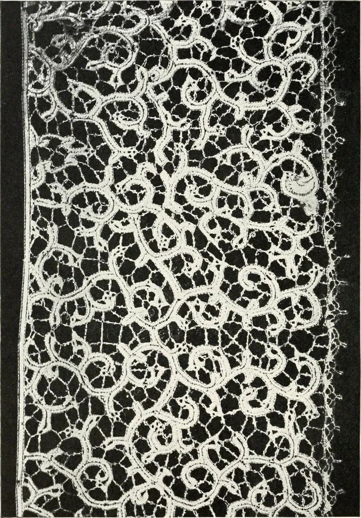 An illustration from Old lace, a handbook for collectors; an account of the different styles of lace, their history, characteristics & manufacture, 1909, leaf 133