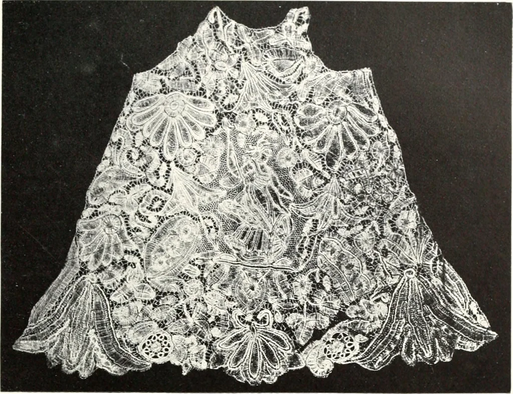 An illustration from Old lace, a handbook for collectors; an account of the different styles of lace, their history, characteristics & manufacture, 1909, leaf 164