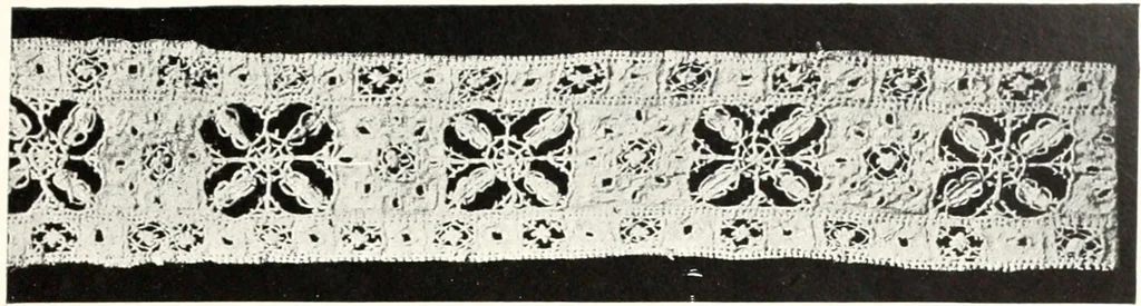 An illustration from Old lace, a handbook for collectors; an account of the different styles of lace, their history, characteristics & manufacture, 1909, leaf 32