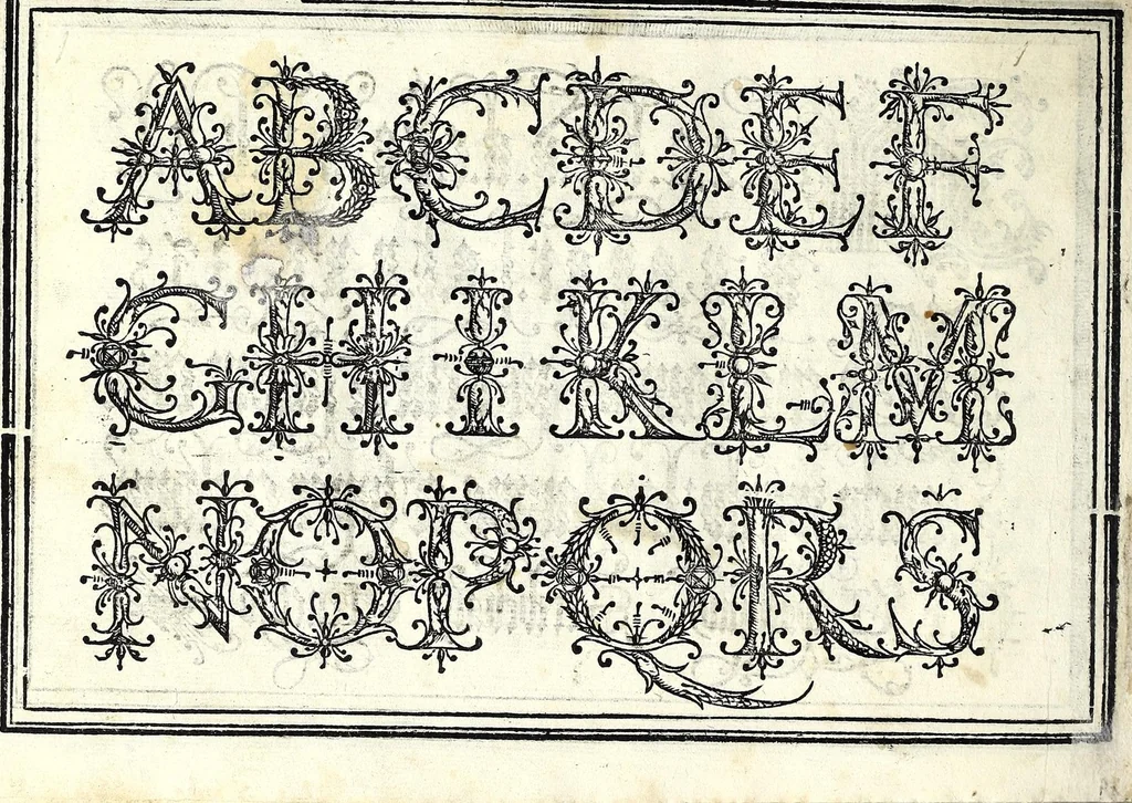 An illustration from Opera di frate Vespasiano Amphiareo da Ferrara dell'ordine minore conventvale, nella qvale s'insegna a scrivere varie sorti di lettere : & massime una lettera bastarda da lui nouamente con sua industria ritrouata, laquale serue al cancellaresco & mercantesco : poi insegna a far l'inchiostro negrissimo con tanta facilità, che ciascuno per semplice che sia, lo saprà far da se : anchora a macinar l'oro, & scriuere con esso come si farà con l'inchiostro, parimente a scriuere con l'azurro, & col cenaprio : opera vtilissima, e molto necessaria all'uso humano : aggivntovi di nvovo dve bellissimi alpha beti di maiuscole, che nell'altre impressioni non si sono piu stampati, 1572, leaf 42