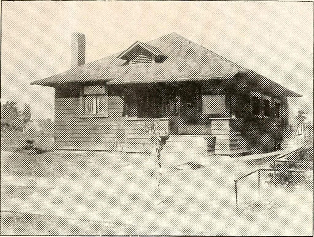 An illustration from The plan book of American dwellings : being a compilation of original home designs, showing actual photographic exteriors and floor plans of moderately priced bungalows, cottages, residences, 1914, leaf 100