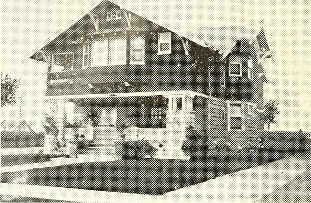 An illustration from The plan book of American dwellings : being a compilation of original home designs, showing actual photographic exteriors and floor plans of moderately priced bungalows, cottages, residences, 1914, leaf 101