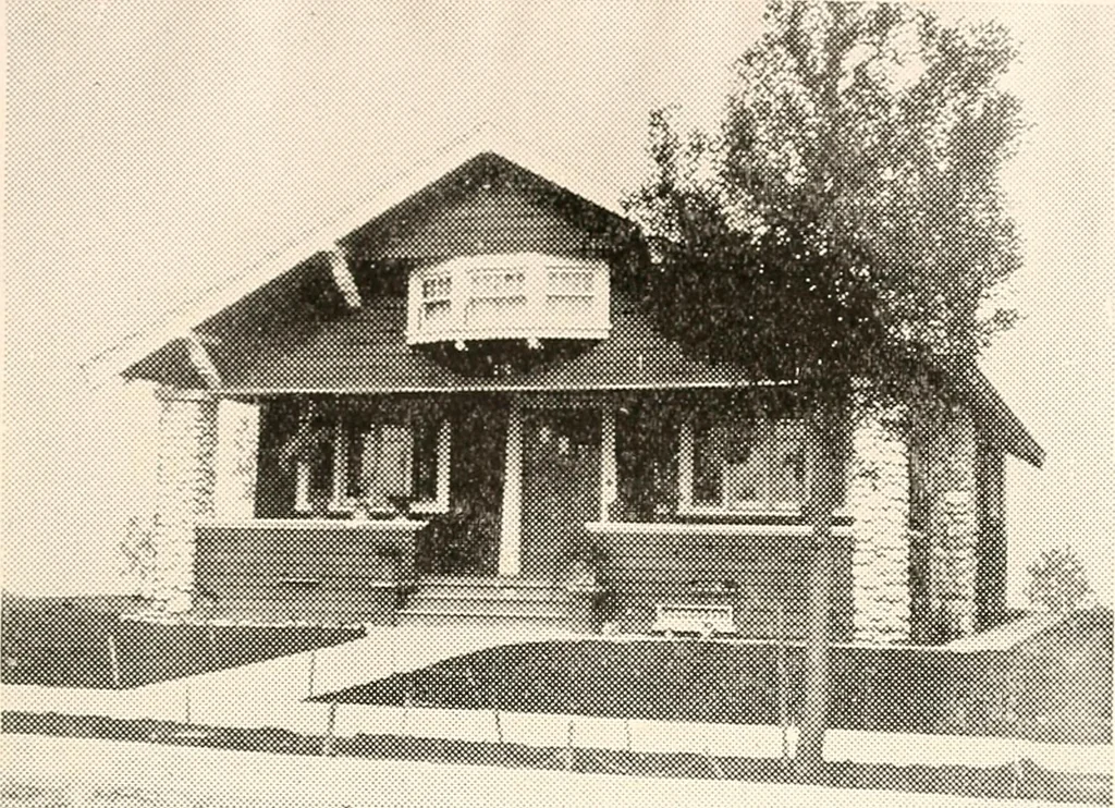 An illustration from The plan book of American dwellings : being a compilation of original home designs, showing actual photographic exteriors and floor plans of moderately priced bungalows, cottages, residences, 1914, leaf 106
