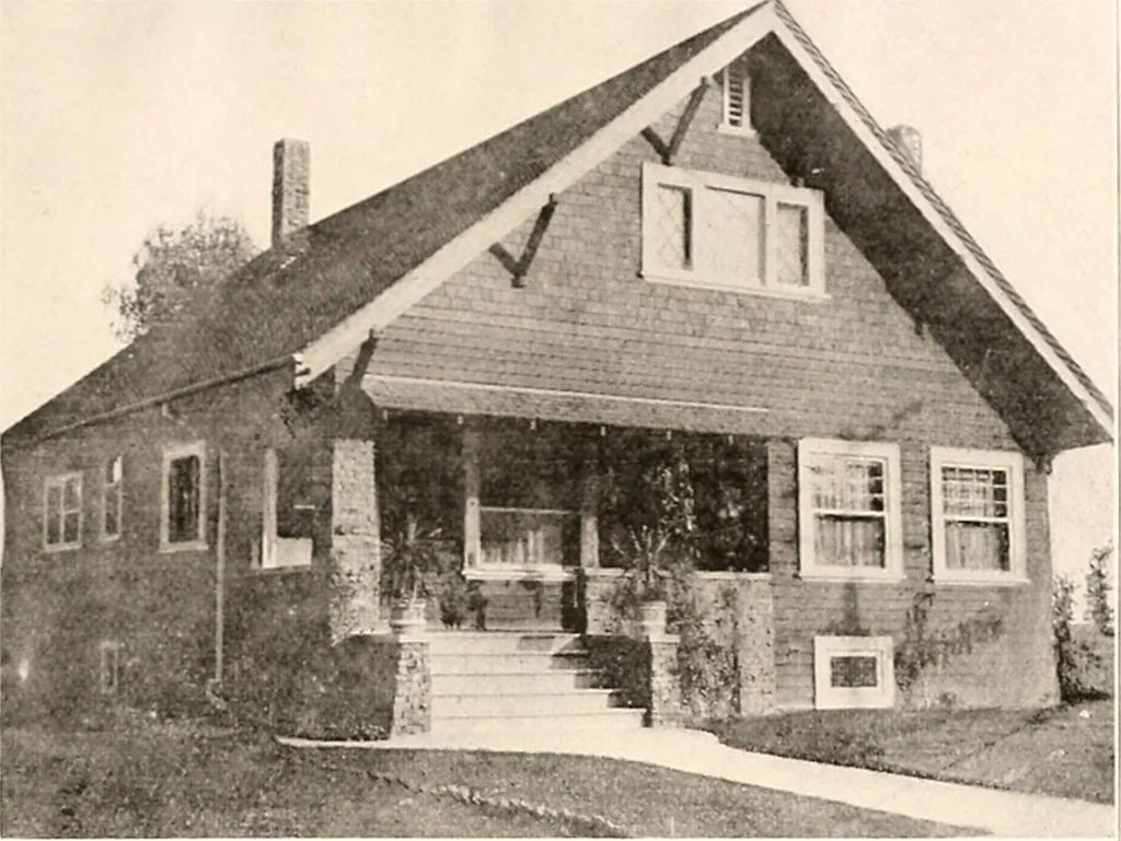 An illustration from The plan book of American dwellings : being a compilation of original home designs, showing actual photographic exteriors and floor plans of moderately priced bungalows, cottages, residences, 1914, leaf 120