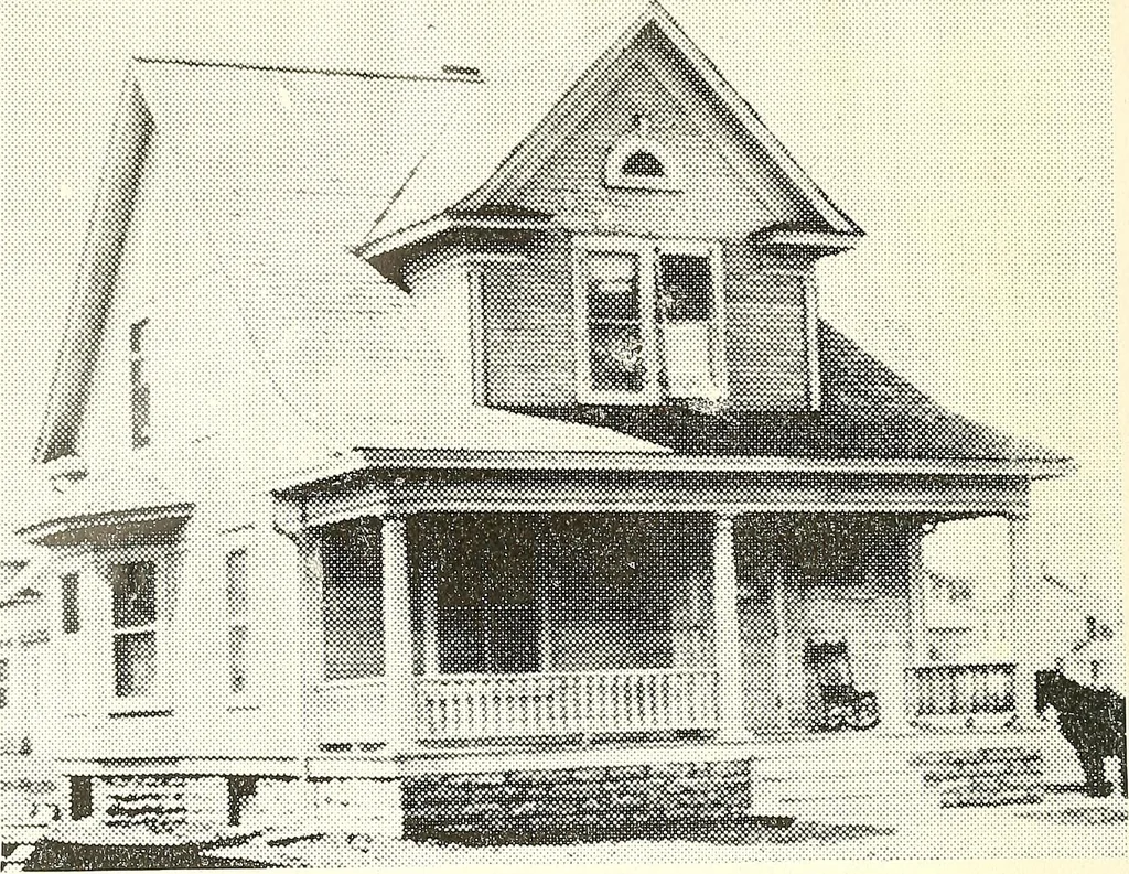 An illustration from The plan book of American dwellings : being a compilation of original home designs, showing actual photographic exteriors and floor plans of moderately priced bungalows, cottages, residences, 1914, leaf 145