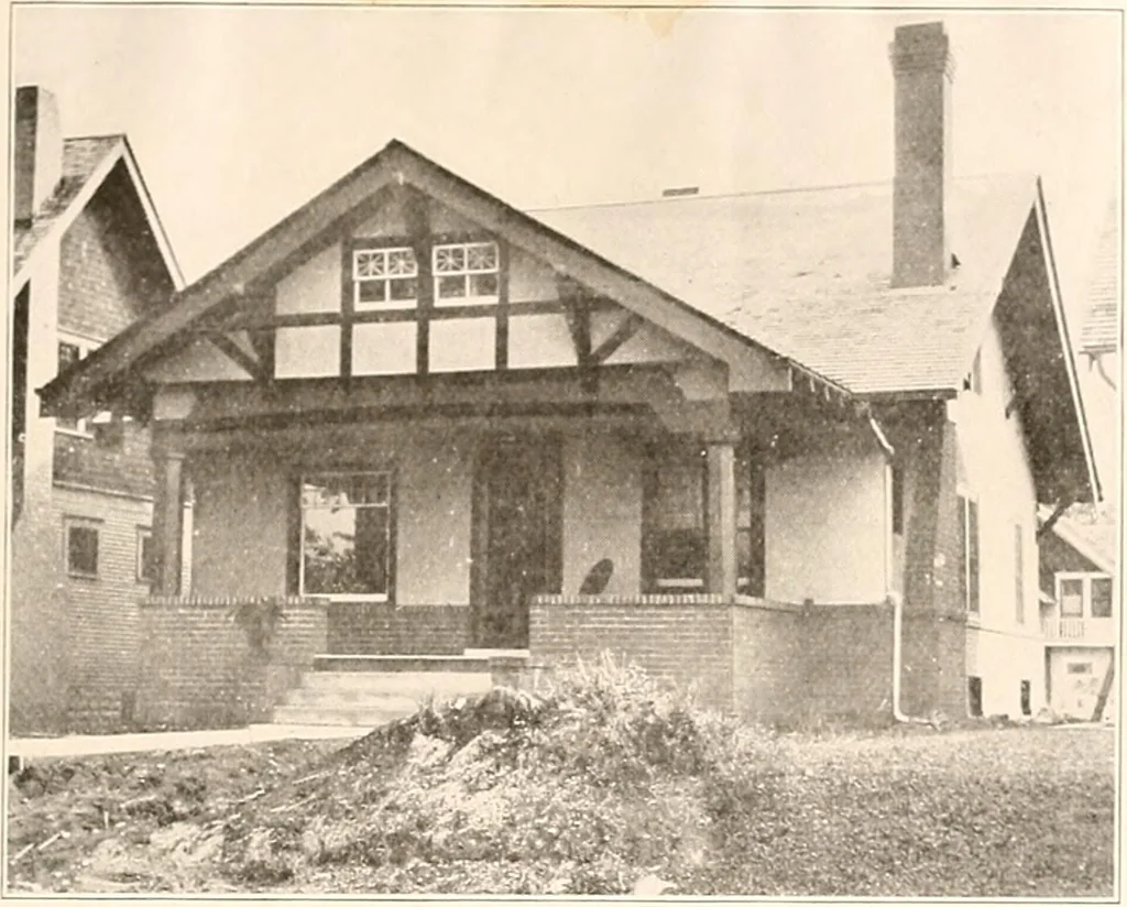 An illustration from The plan book of American dwellings : being a compilation of original home designs, showing actual photographic exteriors and floor plans of moderately priced bungalows, cottages, residences, 1914, leaf 164