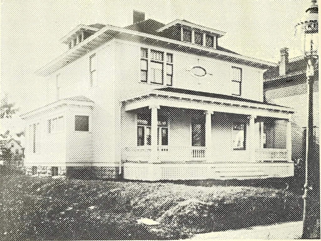 An illustration from The plan book of American dwellings : being a compilation of original home designs, showing actual photographic exteriors and floor plans of moderately priced bungalows, cottages, residences, 1914, leaf 195