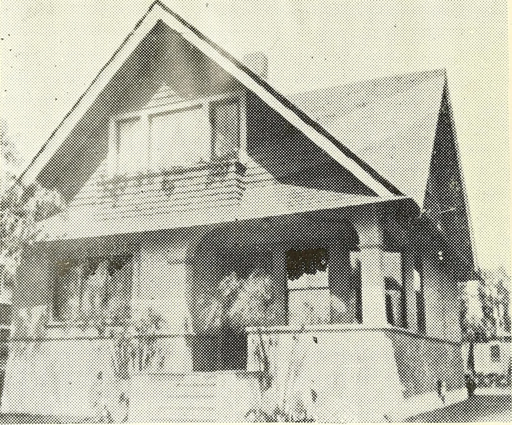 An illustration from The plan book of American dwellings : being a compilation of original home designs, showing actual photographic exteriors and floor plans of moderately priced bungalows, cottages, residences, 1914, leaf 197