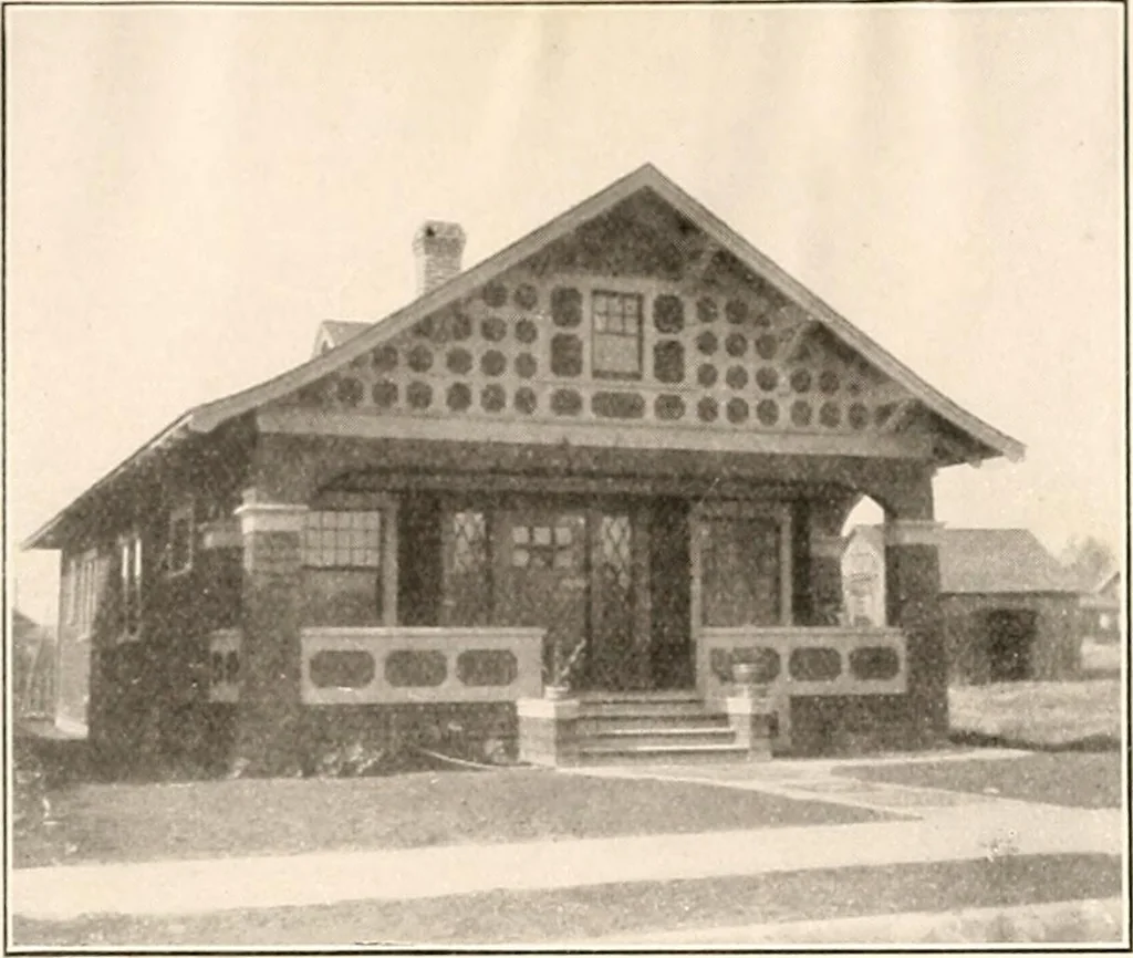 An illustration from The plan book of American dwellings : being a compilation of original home designs, showing actual photographic exteriors and floor plans of moderately priced bungalows, cottages, residences, 1914, leaf 200