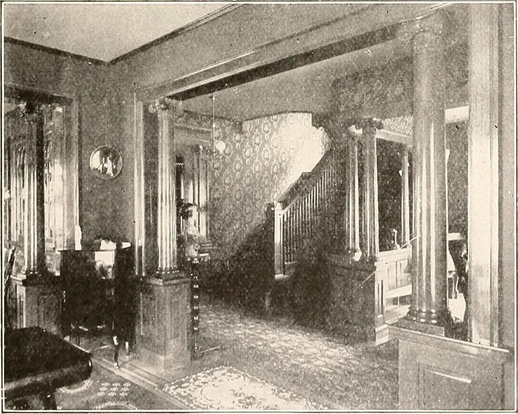 An illustration from The plan book of American dwellings : being a compilation of original home designs, showing actual photographic exteriors and floor plans of moderately priced bungalows, cottages, residences, 1914, leaf 204