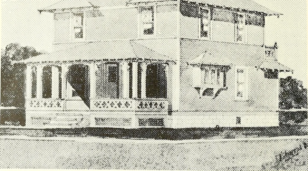 An illustration from The plan book of American dwellings : being a compilation of original home designs, showing actual photographic exteriors and floor plans of moderately priced bungalows, cottages, residences, 1914, leaf 205